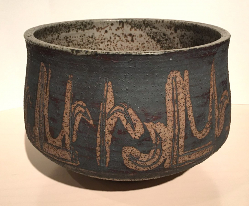 A large bowl form that appears to be inspired by Islamic calligraphy