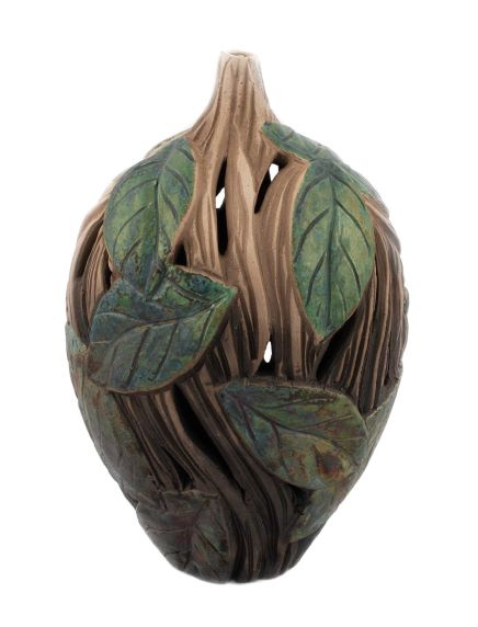 egg-shaped vase from with deep incisions, which break through the clay body, and represent plant leaves and stems. 