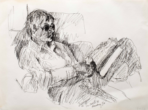 Portrait of a woman reclining, reading a book and wearing sunglasse