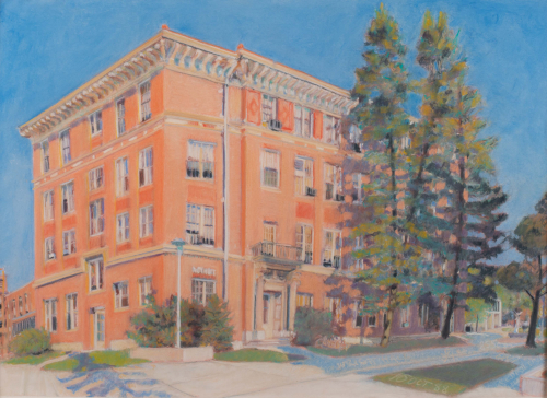 Building exterior in bright sunlight with colors of peach, orange, and blue.  Oblique perspective.