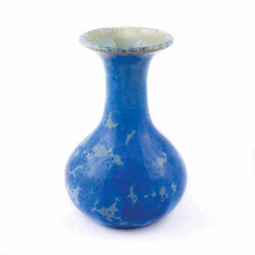 small hourglass-shaped vase with a wide mouth, glazed in two shades of blue and a celadon interior.