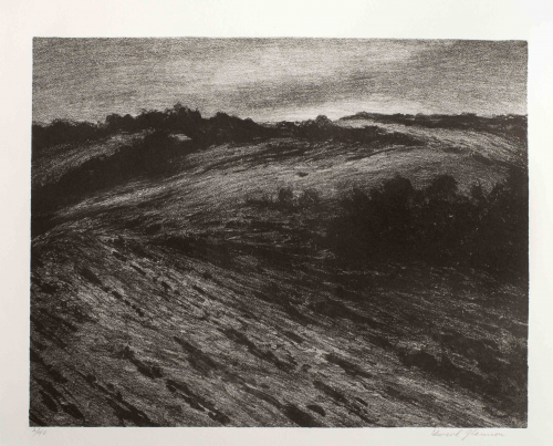 A nighttime landscape, primarily hills with sky in the upper one-third of the composition