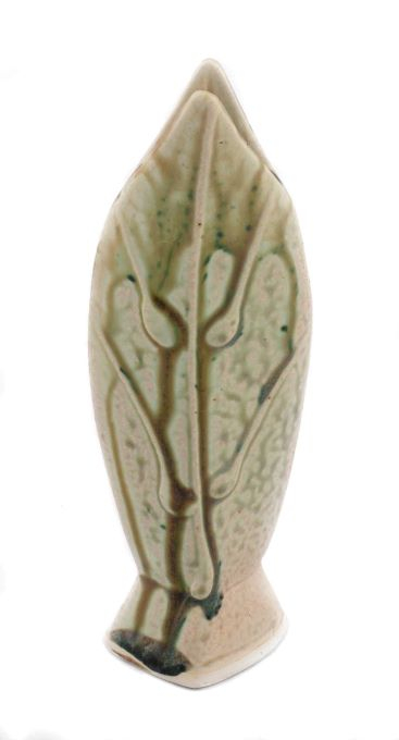 light green bud vase with darker drips running down. resembles two leaves pressed together on a squared base