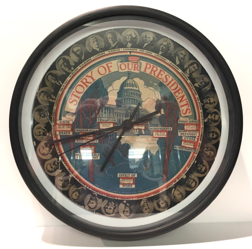 A round wall clock with a depiction of the U.S. state capital building