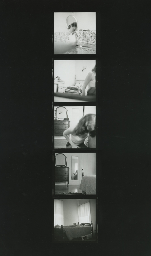 Film-like chronological process of a woman in a bedroom; five separate film strip photos stacked vertically