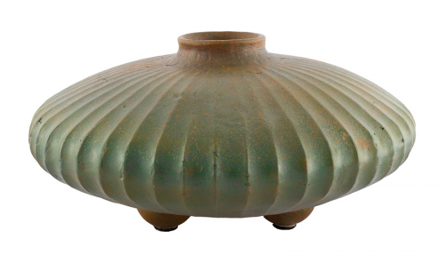 A gourd-shaped green vessel with deep ridges