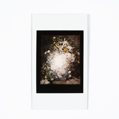Polaroid with glare from flash of white and yellow flowers in a vase. (from series of Polaroids documenting a performance piece)