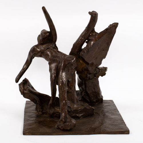 A brown, freestanding, abstracted human form on a square base