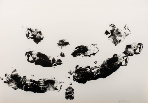 Abstract black and white image made by the artist dragging parts of face over plate.