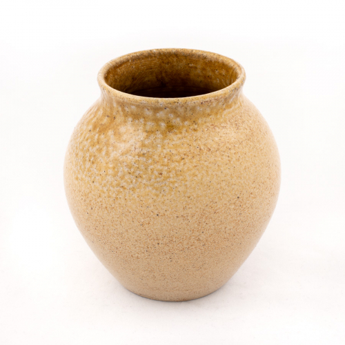 A small egg-shaped vase with a wide mouth glazed in a mottled light beige.