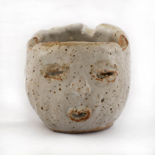 tiny white "face jug" with brown specks