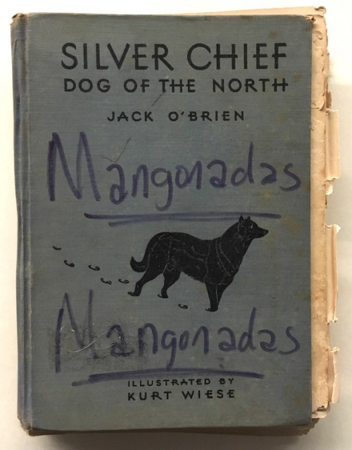 An altered book from 1933 with the words Silver Chief and Mangonadas