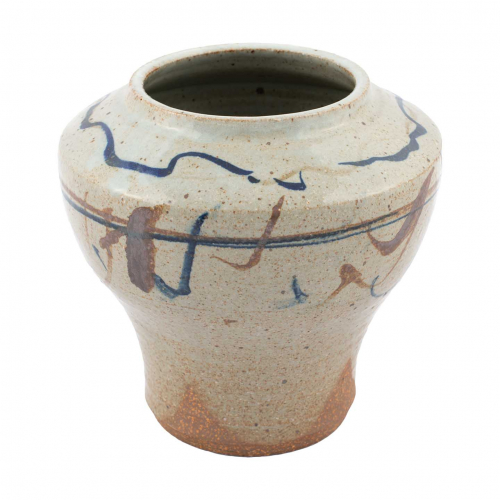 vase with wide shoulders and an opening and base of equal size. beige glazing with curvilinear markings in brown and blue