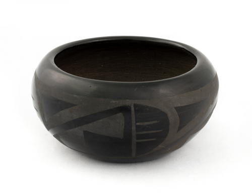  small blackware, jar-shaped pot, outer body band of decoration has a geometrical kiva-step design
