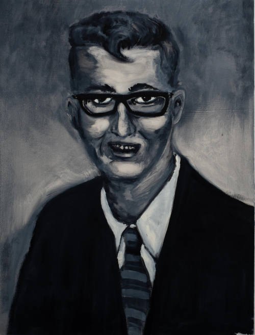 Black and white portrait of a man with black glasses, a striped necktie and black suitcoat