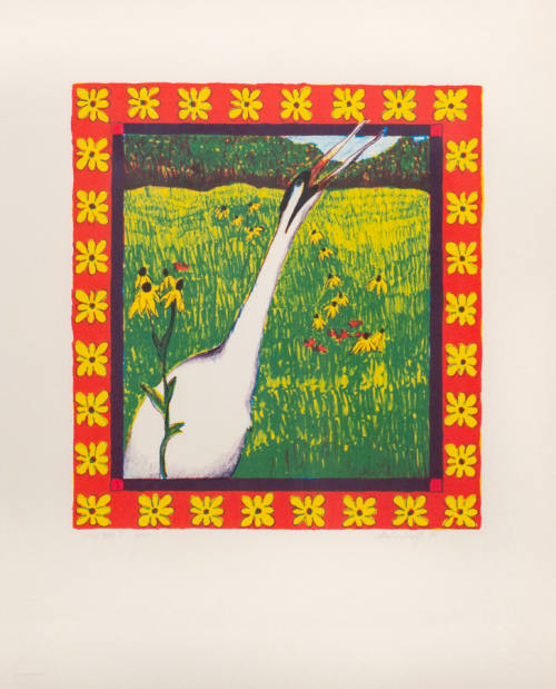 Image of a white crane in a meadow with yellow flowers and a line of trees in the distance. The image is bordered in flowers